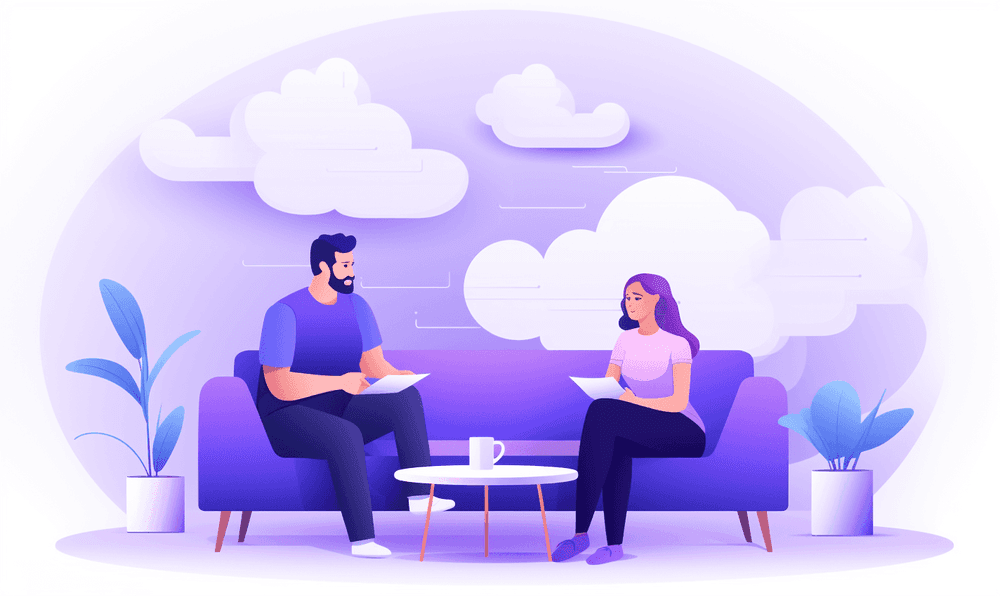 Two people having an in-person one on one meeting.